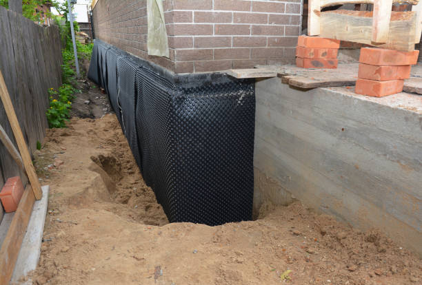 Happy homeowners after waterproofing job in Somers Point